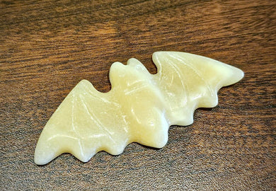 Yellow calcite bat