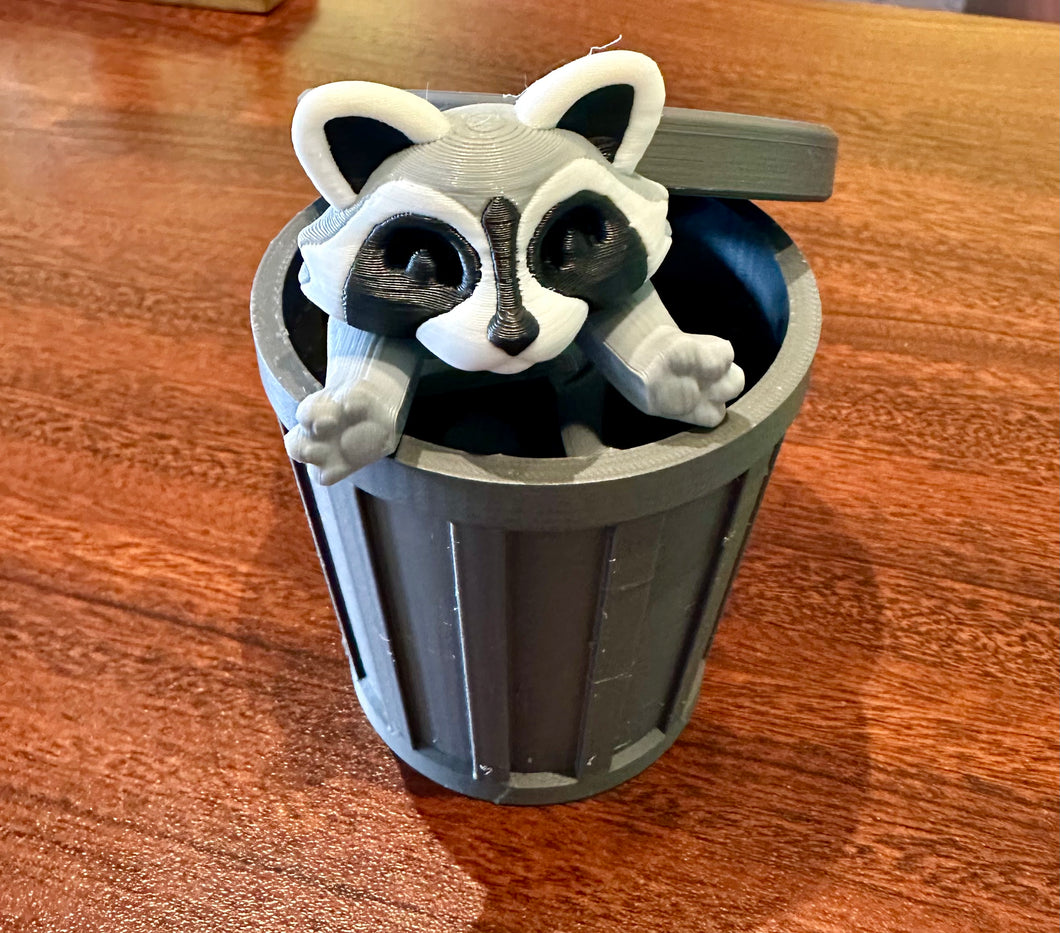 Raccoon in a trash can