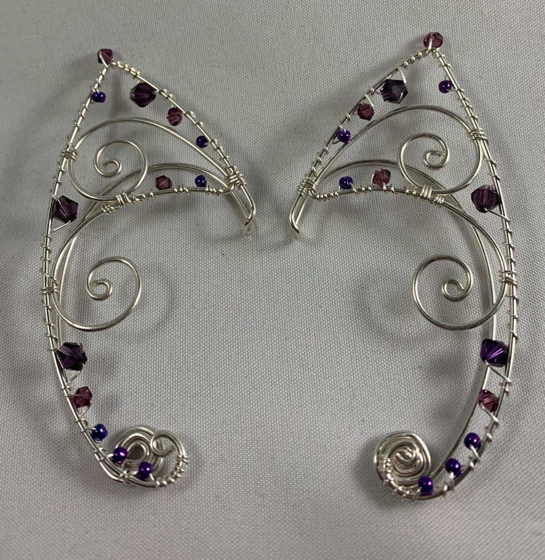 Elf ears-small iridescent purple crystals