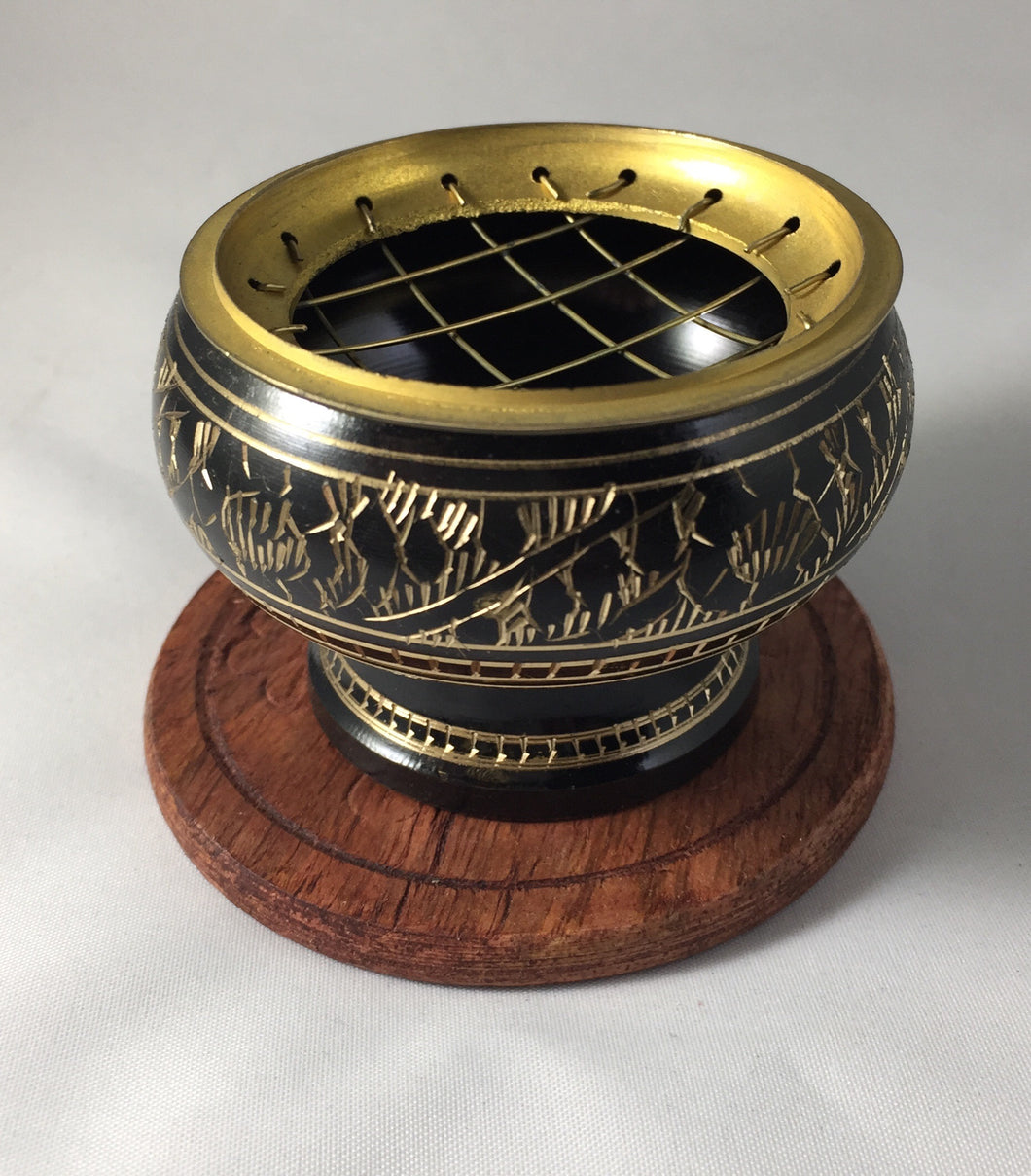 Black and gold pedestal resin burner